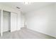 Carpeted bedroom featuring a closet for storage at 14893 Sw 23Rd Pl, Ocala, FL 34481