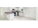 Bright kitchen featuring sleek appliances, countertops, and ample cabinet space at 14893 Sw 23Rd Pl, Ocala, FL 34481
