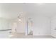 An open living space boasts white walls and vaulted ceilings at 14893 Sw 23Rd Pl, Ocala, FL 34481
