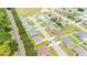 An aerial view of a home, outlined in red, in a neighborhood with many single Gathering homes at 162 Nw 42Nd Pl, Ocala, FL 34475