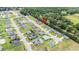 An aerial view of a neighborhood with many single Gathering homes at 162 Nw 42Nd Pl, Ocala, FL 34475