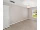 This bedroom features wood floors and a spacious closet at 16605 Sw 31 Cir, Ocala, FL 34473