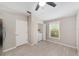 Bright dining area adjacent to the kitchen with a laundry closet, window, and tile floor at 16605 Sw 31 Cir, Ocala, FL 34473