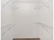 A functional walk-in closet has metal racks at 16605 Sw 31 Cir, Ocala, FL 34473