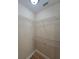 Walk-in closet with wire shelving at 20 Malauka Trail Crse, Ocklawaha, FL 32179