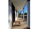 Welcoming porch with pillars, newly constructed with a sidewalk leading to the front door at 20 Malauka Trail Crse, Ocklawaha, FL 32179