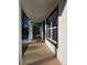 Spacious porch with pillars, newly constructed with a sidewalk leading to the front door at 20 Malauka Trail Crse, Ocklawaha, FL 32179