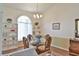 Charming dining area bathed in natural light, complete with stylish furnishings, perfect for Gathering gatherings and dining at 2478 Nw 50Th Ave, Ocala, FL 34482
