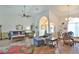 Spacious living room featuring modern furnishings, vaulted ceilings and arched doorway, perfect for relaxation and entertaining at 2478 Nw 50Th Ave, Ocala, FL 34482