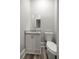 Powder room with granite countertop and vanity at 4609 Ne 7Th St, Ocala, FL 34470