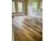 Bedroom with large windows, hardwood floors, and great lighting at 4609 Ne 7Th St, Ocala, FL 34470