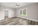 Bedroom with wood floors, natural light and closet space at 4609 Ne 7Th St, Ocala, FL 34470