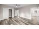 Bedroom with closet, bathroom, and wood floors at 4609 Ne 7Th St, Ocala, FL 34470
