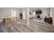 Inviting staged living room with fireplace, comfortable seating, and contemporary decor at 4609 Ne 7Th St, Ocala, FL 34470