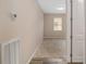Bedroom hallway with wood-look tile flooring at 5587 Nw 40Th Pl, Ocala, FL 34482
