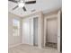 Cozy bedroom with closet and ceiling fan at 5587 Nw 40Th Pl, Ocala, FL 34482