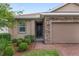 Inviting front entrance with a stone facade and a warm, neutral color palette at 5587 Nw 40Th Pl, Ocala, FL 34482