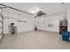 Spacious garage with epoxy floors and custom cabinetry at 5587 Nw 40Th Pl, Ocala, FL 34482