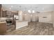 Modern kitchen with stainless steel appliances, granite countertops, and pendant lighting over the island at 5587 Nw 40Th Pl, Ocala, FL 34482