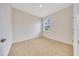 The bedroom offers neutral carpet and light-filled space at 6318 Sw 89Th Lane Rd, Ocala, FL 34476