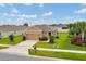 Inviting single-Gathering home boasting a well-maintained lawn and a two-car garage at 6318 Sw 89Th Lane Rd, Ocala, FL 34476