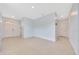Open concept living area with light-filled interior and ceramic tile floors at 6318 Sw 89Th Lane Rd, Ocala, FL 34476