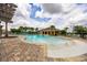 Community pool with zero entry access and lounge chairs for relaxing poolside at 6318 Sw 89Th Lane Rd, Ocala, FL 34476
