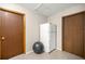 This pantry is equipped with a full refrigerator and two separate doors at 6497 W Anthony Rd, Ocala, FL 34479