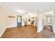 Updated kitchen with stainless appliances, white cabinetry, and access to dining area at 6511 Se 25Th Ave, Ocala, FL 34480