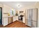 Bright kitchen features stainless steel appliances, granite countertops, and ample cabinet space at 6511 Se 25Th Ave, Ocala, FL 34480