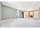 Expansive main bedroom with natural light and ensuite bathroom at 6511 Se 25Th Ave, Ocala, FL 34480