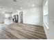 Bright and spacious living area featuring hardwood floors and plenty of natural light at 75 Guava Ter, Ocklawaha, FL 32179