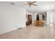 Open-concept dining area features tile floors, seamlessly connecting to the kitchen, and a spacious living area at 7881 Sw 89Th Cir, Ocala, FL 34481