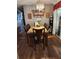 Dining room with seating for six, complete with elegant lighting and decor at 8343 Sw 105Th Pl, Ocala, FL 34481