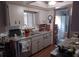 Kitchen area featuring modern appliances, countertop space, and a double basin sink at 8343 Sw 105Th Pl, Ocala, FL 34481