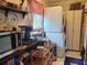 Convenient laundry room equipped with stacked washer and dryer at 8343 Sw 105Th Pl, Ocala, FL 34481