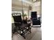 Sunroom with tiled floors, glider chair, and comfortable seating at 8343 Sw 105Th Pl, Ocala, FL 34481