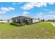 Enjoy serene outdoor living in this home with a screened-in lanai and plenty of space at 8802 Sw 79Th Loop, Ocala, FL 34481