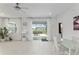 Bright dining area with sliding glass doors leading to an outdoor patio and backyard at 8802 Sw 79Th Loop, Ocala, FL 34481