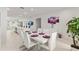 Spacious dining area with an open layout, featuring modern furniture, and plenty of natural light at 8802 Sw 79Th Loop, Ocala, FL 34481