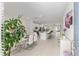 Bright, open-concept living space that flows from the dining area to the kitchen with a view of the outdoor pool at 8802 Sw 79Th Loop, Ocala, FL 34481