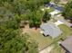 Aerial view of the property showing lush greenery and surrounding neighborhood at 9432 Se 159Th Ln, Summerfield, FL 34491