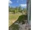 Fenced backyard on a treed lot, partially cleared at 1013 Nw Mandrake Dr, Dunnellon, FL 34431