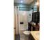 Bathroom with a shower/tub combination, toilet and cabinet at 1013 Nw Mandrake Dr, Dunnellon, FL 34431