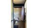 Bathroom with tub and shower with white tile surround at 1013 Nw Mandrake Dr, Dunnellon, FL 34431