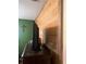 Bedroom features wood accent wall and TV at 1013 Nw Mandrake Dr, Dunnellon, FL 34431