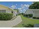 Home with a sidewalk and well-maintained yard at 10699 Se 178Th St, Summerfield, FL 34491