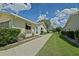 Home with a sidewalk and well-maintained yard at 10699 Se 178Th St, Summerfield, FL 34491