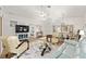 Bright living room featuring hard wood floors, vaulted ceilings, modern decor and an open floor plan at 11051 Sw 73Rd Ct, Ocala, FL 34476