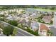 Charming neighborhood with golf course and lake views, featuring mature landscaping and well-kept homes at 1204 Flamingo Pl, The Villages, FL 32162